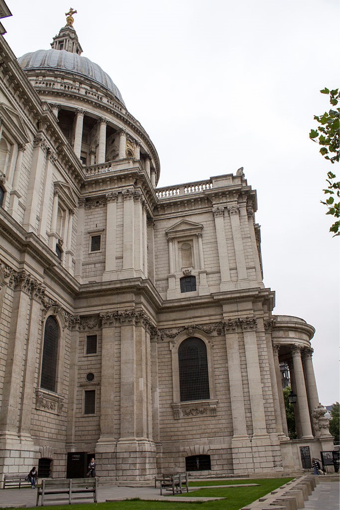 This photograph shows the exterior architectural details of St Paul's Cathedral's southern facade (looking east) in London, England.