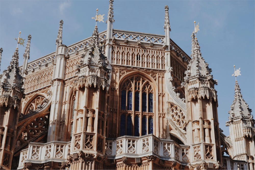 The elaborate gothic architecture of Westminster Abbey can be seen in this close-up photo taken in London, England.